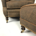 Cyrus Leather Tilt Back Chair & Ottoman by Wesley Hall shown in Zulu Chocolate leather - close up base