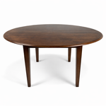 56" Round Extendable Tapered Leg Dining Table