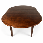 56" Round Extendable Tapered Leg Dining Table