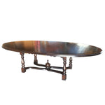 English Oval Refectory Table on a Wavy Stretcher with Turned Finial