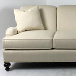 Signature Elements Sofa by Wesley Hall shown in Matrix Cream fabric and Espresso wood finish - front view close up
