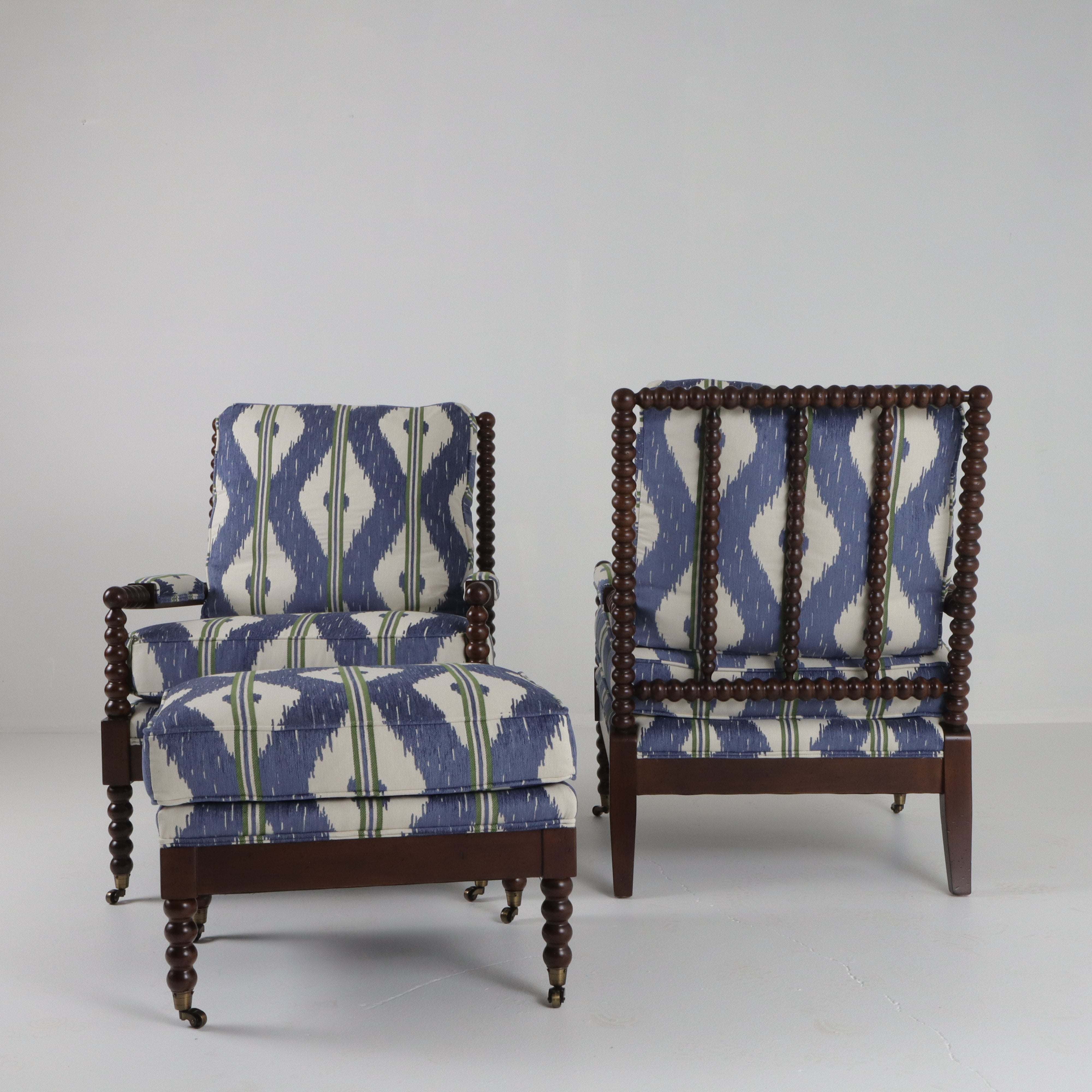 Pair of Marshall Chairs and Ottoman