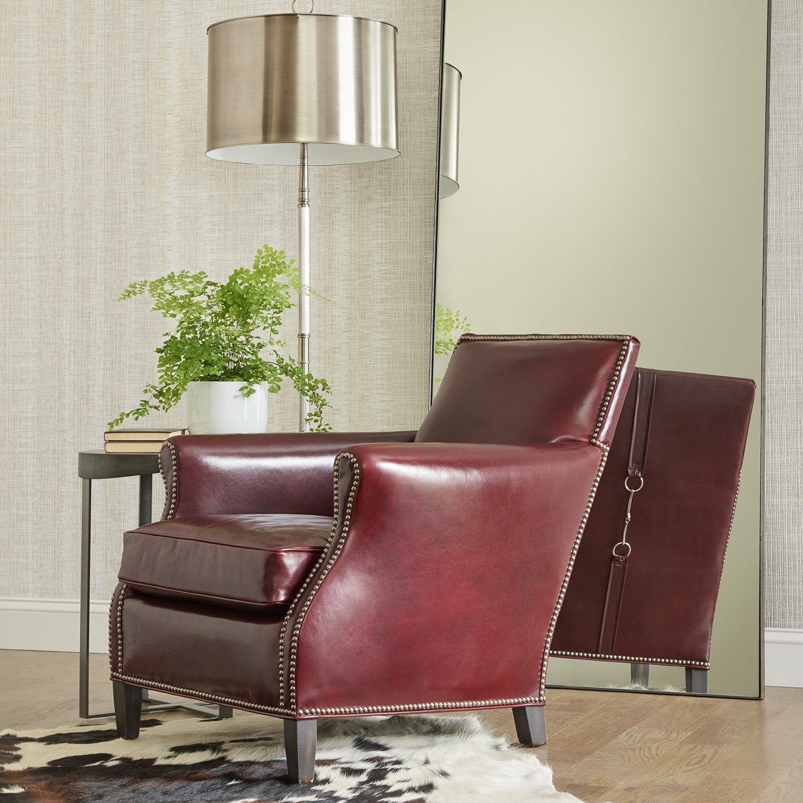 Wilborn Leather Chair by Wesley Hall shown in Matador Garnet leather and leather Bridle Banding on back