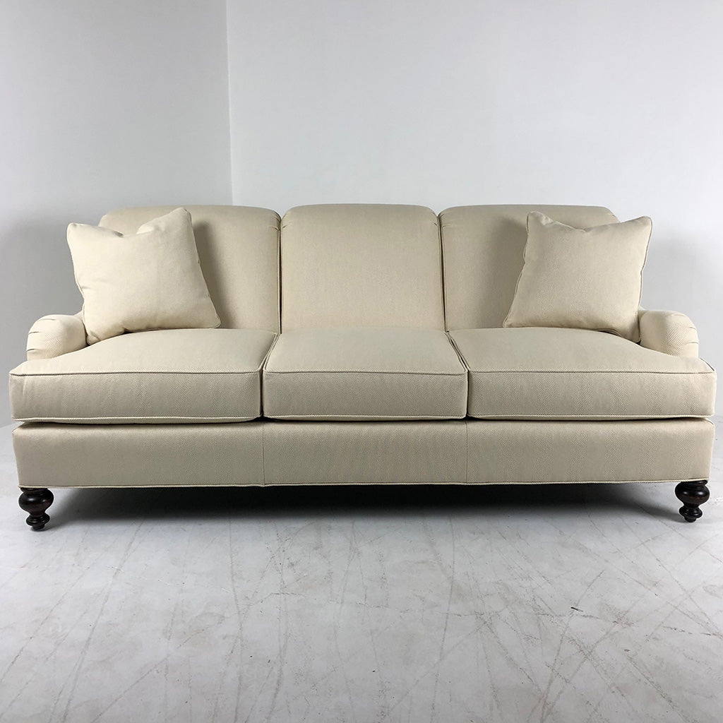 Signature Elements Sofa by Wesley Hall shown in Matrix Cream fabric and Espresso wood finish.