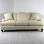 Signature Elements Sofa by Wesley Hall shown in Matrix Cream fabric and Espresso wood finish.